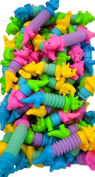 Colorful plastic toys shaped like sea creatures on a white background